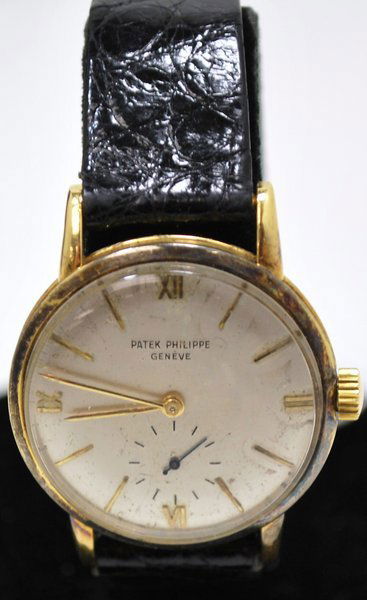 18KT Y.G. PATEK PHILIPPE REF#1471: MANAUL WIND SILVER TONE DIAL HAS SOME AGE SPOTS APPEARS ORIGINAL 33MM CASE WITH CROWN HAS ARCHIVE PAPERS