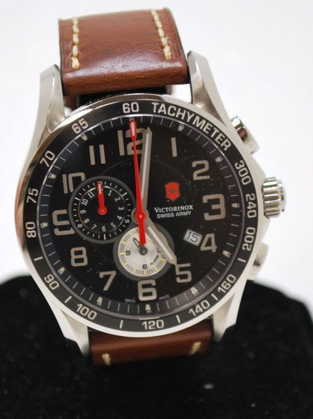 VICTORINOX ALARM CHRONOGRAPH: S/S CASE WITH BLACK DIAL AND LEATHER BAND. COMES WITH BOX AND PAPERS.