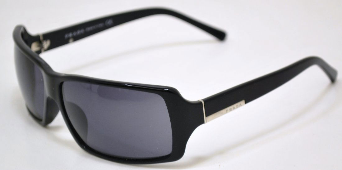 PRADA SUNGLASSES: MODEL SPR24G, COMES WITH HARD CASE, CLEANING CLOTH AND PAPERS.