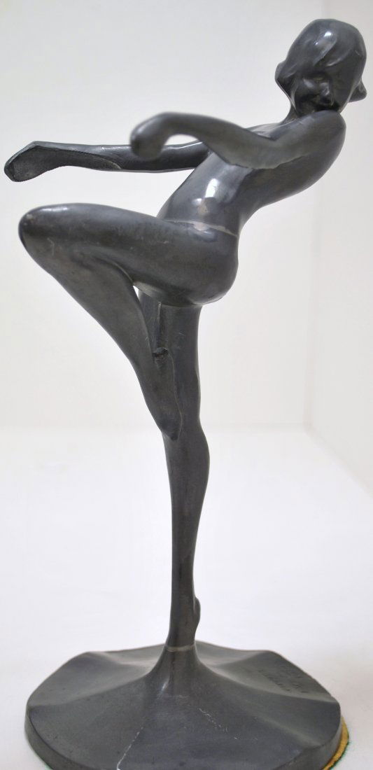 ART DECO FRANKART STATUE: OF A WOMAN SIGNED AND DATED 1922 ON BASE MEASURING APPROX. 9.75" TALL APPEARS TO BE MADE OF PEWTER