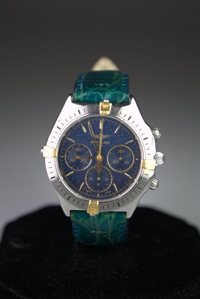 S/S BREITLING CHRONOGRAPH: MANUAL WIND BREITLING ON BLUEGREEN STRAP, WITH ORIGINAL BUCKLE