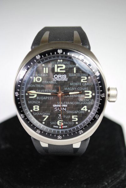 MENS TITANIUM ORIS GRAND PRIX NEW B&P: DAY DATE AUTO WITH CARBONFIBER DIAL RUBBER DEPLOYMENT STRAP 49MM CASE WITH CROWN NEW WITH BOX AND PAPERS