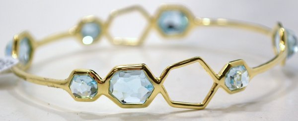 18KT Y.G. IPPOLITA TOPAZ BANGLE NEW: SET WITH FANCY CUT TOPAZ SOLID BANGLE TWT 15.8 GRAMS WILL FIT AVERAGE WRIST