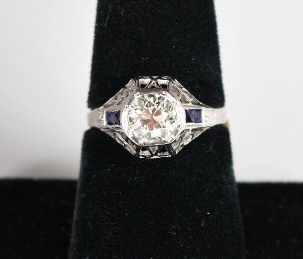 14KT W.G. ART DECO 1.11CT DIAMOND RING: CIRCA 1930'S SET WITH 1.11CT EUROPEAN CUT L-M COLOT VS QUALITY DIAMOND PLUS ACCENT SAPPHIRES 3.1 GRAMS SIZE 7.25