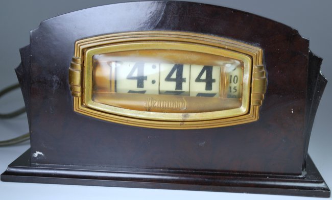 ART DECO WENNWOOD FLIP CLOCK: CIRCA 1930'S BAKELITE CASE APPROX. 7" LONG X 4" TALL CLOCK WORKS