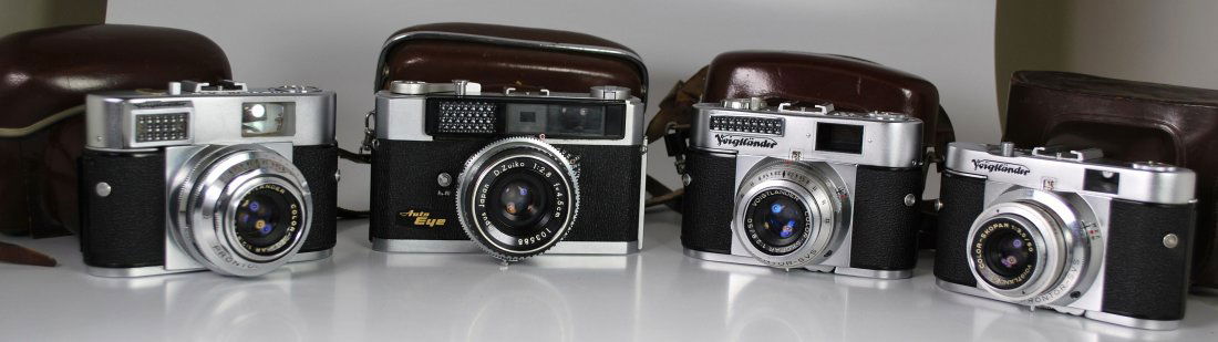 Lot of 4 Vintage Cameras: 3 Voigtlander Cameras: Vitomatic I, Vito B and Vito BL cameras, all with leather cases, and 1 Olympus Auto Eye, also with leather case