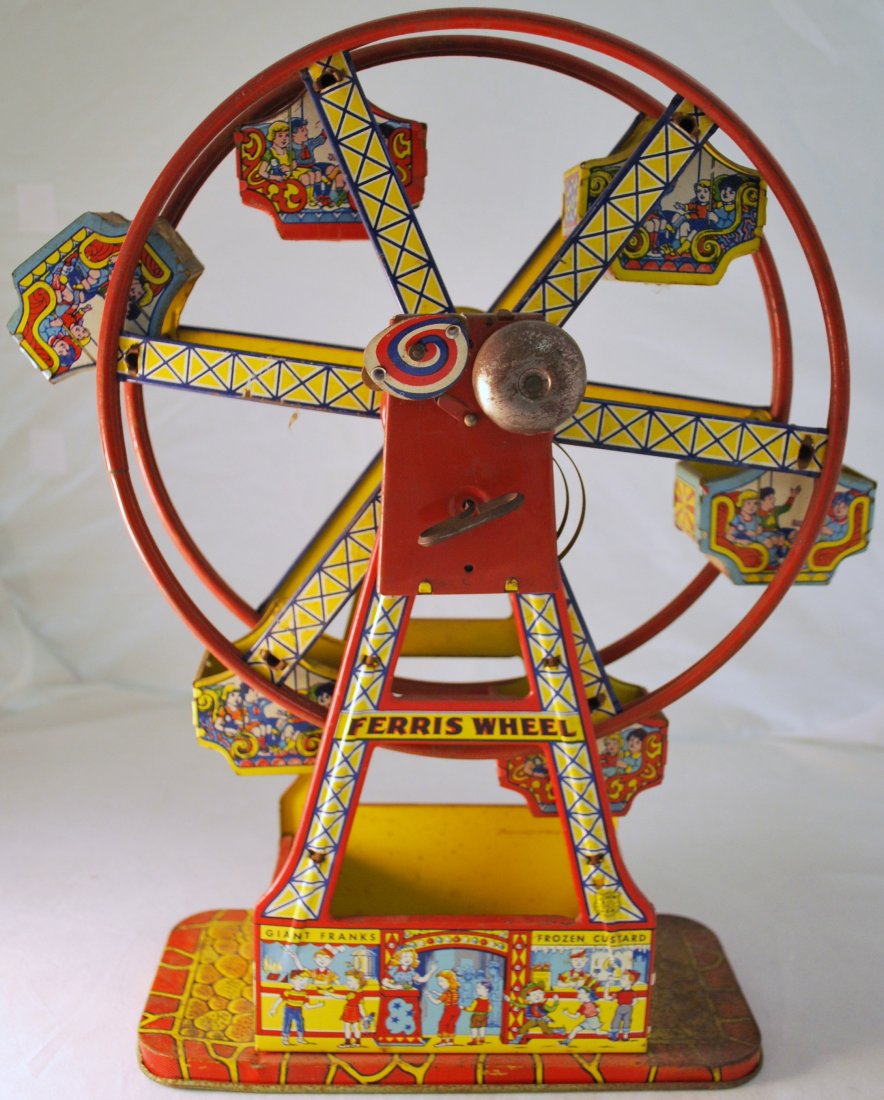 CIRCA 1940'S FERRIS WHEELTIN TOY: FUNCTIONAL WIND UP TOY MADE OF TIN COMPLETE APPROX. 18" TALL