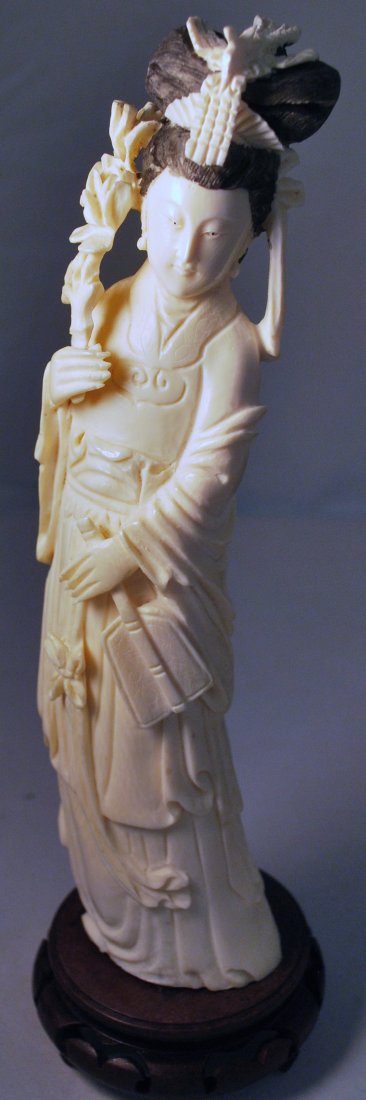 IVORY WOMAN: CARVED IVORY WOMAN STANDING HOLDING FAN APPROX. 10" TALL NOT FOR EXPORT OR SALE TO CALIFORNIA