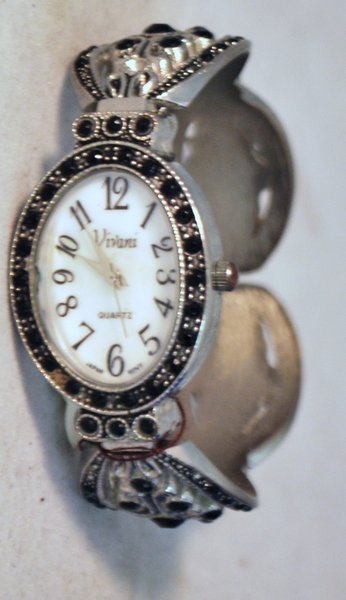LADIES VIVANI MARCASITE WATCH: QUARTZ MOVEMENT BANGLE STYLE FLEX BAND