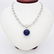 Modern 18K Gold, diamond large round Tanzanite Necklace