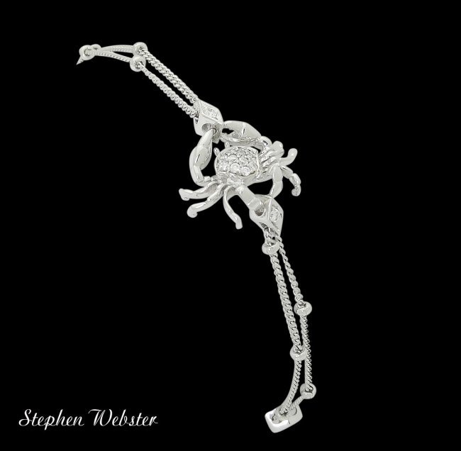 Stephen Webster Jewels Verne 18k White Gold & 0.16: Brand: Stephen Webster, Jewels Verne Collection Metal: 18K White Gold Stones & Gems:16 Diamonds, 0.16 TCW Total Item Weight:6.1 grams Size:6.5 inches Crab Measurements: 11 x 15mm