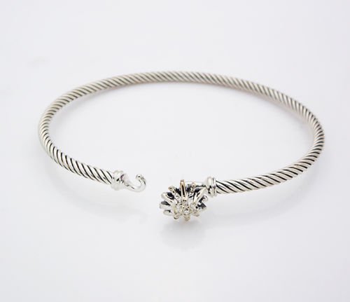 David Yurman Starburst Single-Station Cable Bracelet: David Yurman Starburst Single-Station Cable Bracelet with Diamonds Collection: The Starburst collection Metal: Sterling silver. 925 Stones: Diamonds TCW 0.04 Width: 3 mm. approx Weight: 11 g. approx. 