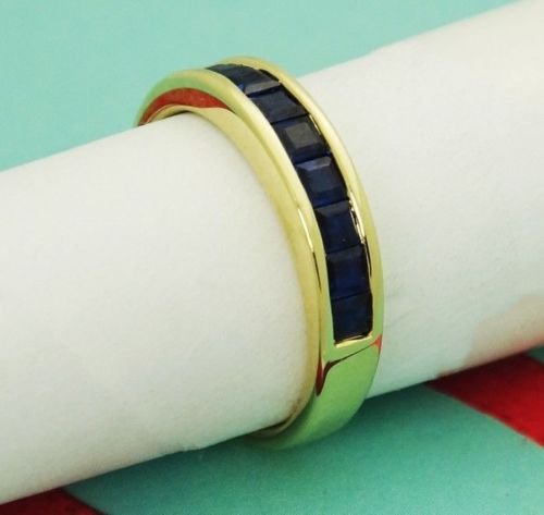 Tiffany & Co 18k Yellow Gold Sapphire Band Size 6.5: Tiffany & Co 18k Yellow Gold Sapphire Band Size 6.5 Precious Metal Type:750 18k Yellow Gold Stones: Sapphire Size: 6.5 width: 3.75mm Front Design: 17.09mm Item Weight: 4.0 grams