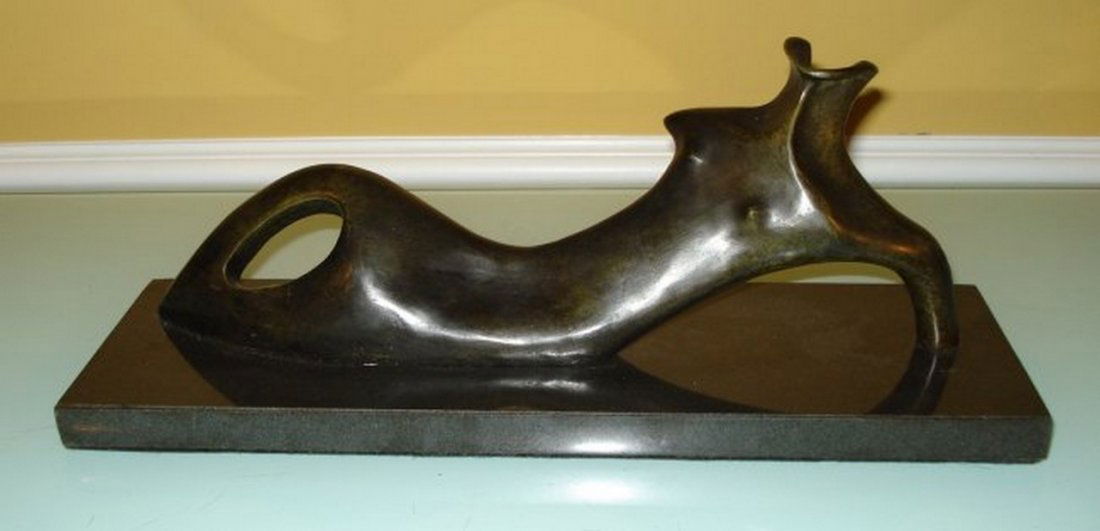 HENRY MOORE BRONZE ABSTRACT NUDE SCULPTURE: HENRY MOORE BRONZE ABSTRACT NUDE SCULPTURE Henry Moore (ENGLISH, 1898 – 1986). Large bronze sculpture depicting an abstract nude. After Signed Moore and numbered 6/9 Measures: Bronze: 17.5" L x 7 3/