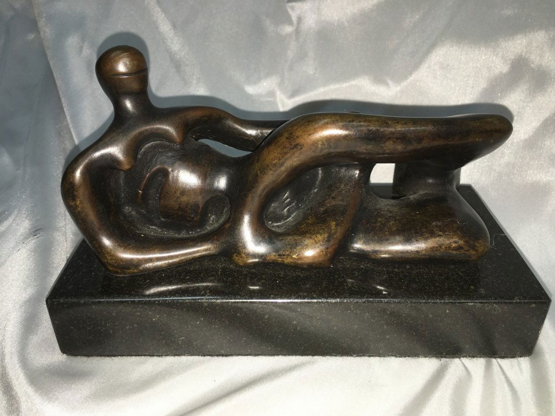 HENRY MOORE ENGLISH BRONZE NUDE SCULPTURE: Henry Moore (ENGLISH, 1898 – 1986). Bronze sculpture depicting an abstract nude. Signed Moore Measures: Bronze: 6" L x 3 1/4"H x 3\"W Base: 7""""L x 3"""" W x 1 1/4"""" H After"""