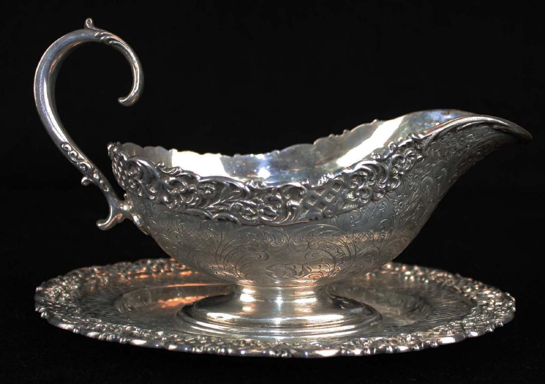 ornate late Victorian sterling silver  gravy boat with (1 of 8)