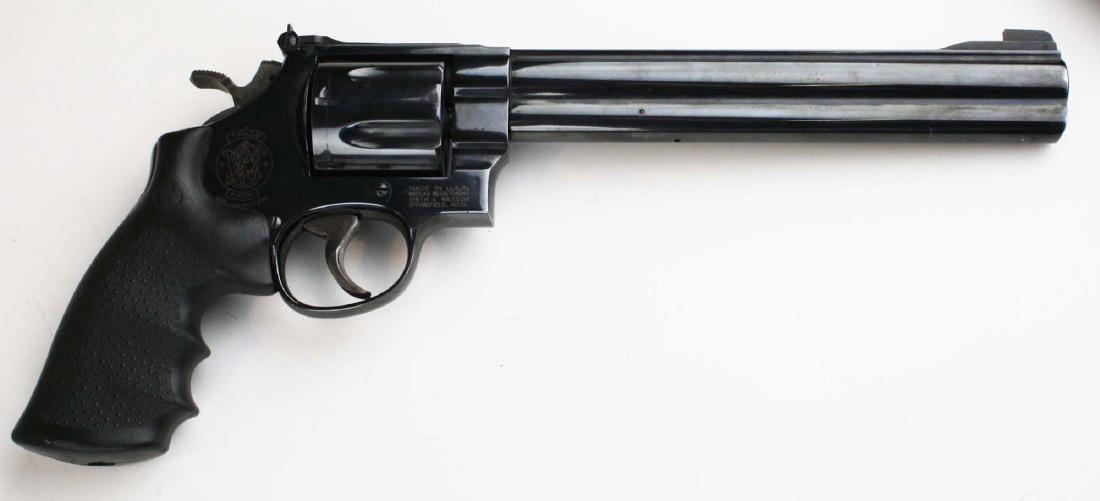 Smith and Wesson 29 classic: Smith and Wesson Model 29 classic in .44mag with rare 8.5" barrel comes with case and spare aftermarket sights/scope mount.