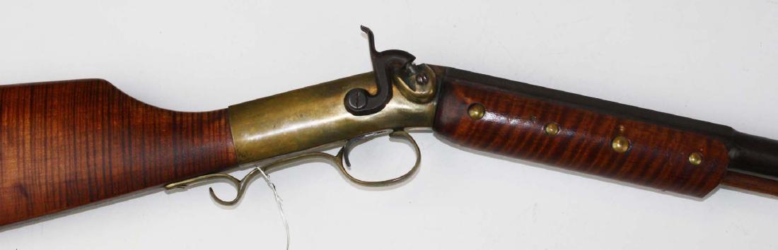 Mowrey percussion cap single shot rifle: Mowrey percussion cap .50 cal. smooth bore single shot rifle, half rd, half oct. barrel, brass hardware, 8 brass tacks, curly maple stock & forearm, 27" barrel, 43" overall length