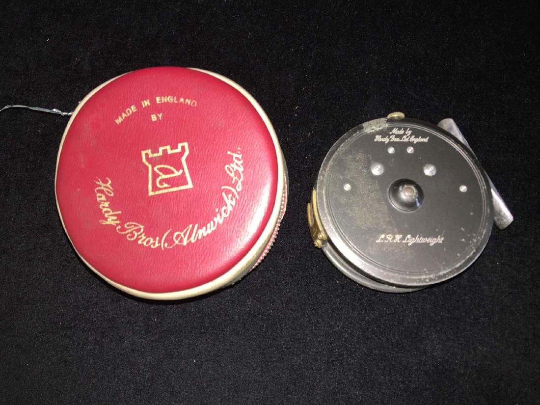 hardy L R H lightweight fly reel.: Hardy Bros. Ltd England L R H lightweight fly reel with original canvas case. Used condition.