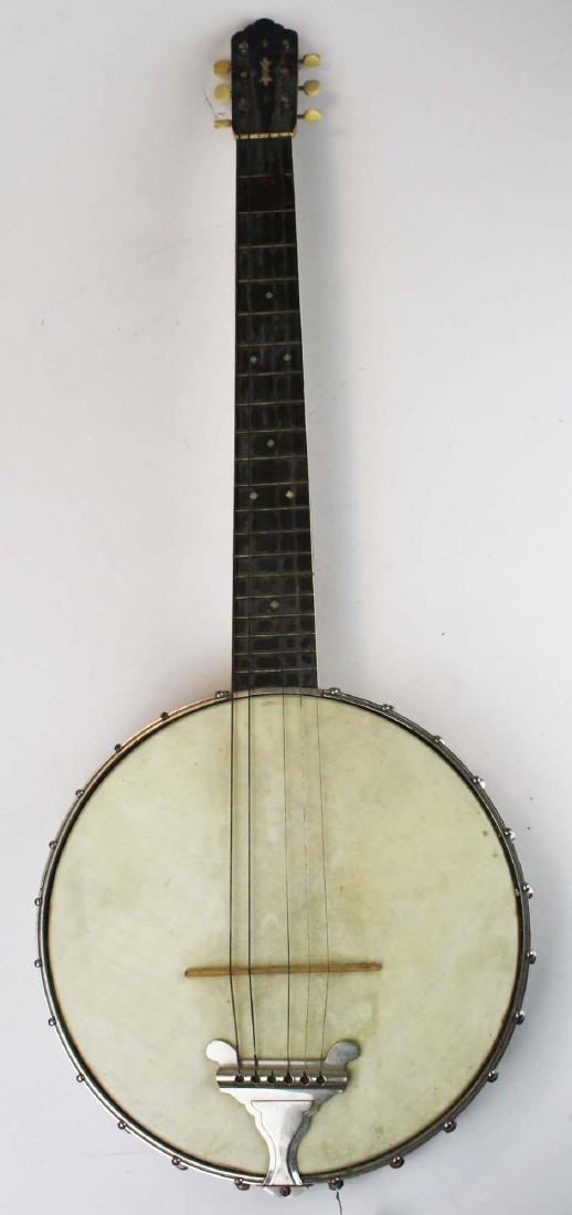 six string Banjo /Banjitar: early 20th c Banjitar with figured maple neck mother of pearl inlaid headstock, and vegetable ivory tuning keys. Unmarked, but serial numbered 525.