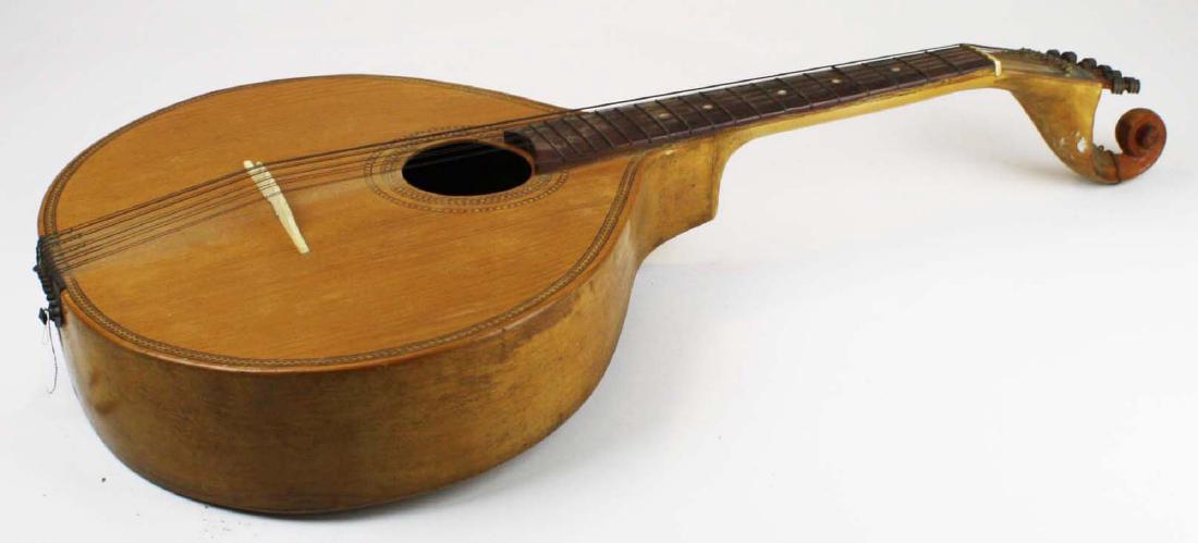 19th or early 20th century Portuguese Fado Guitar: 19th/Early 20th century Portuguese Fado Coimbra Guitar (18.5" Scale) with hard shell case, Guitar uses unusual Preston style tuners. Instrument has loose frets and crack/separation to the back, has bo