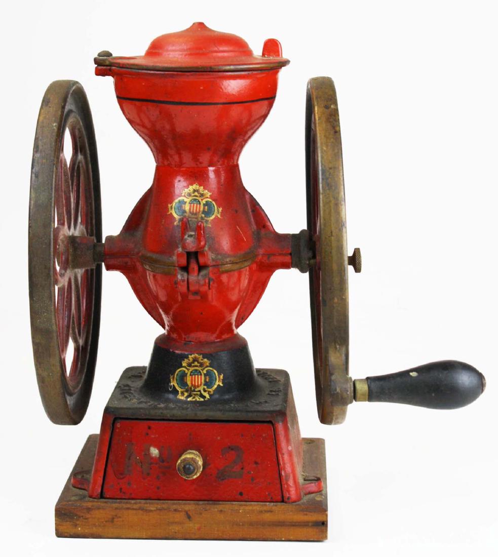 Enterprise No 2 table top coffee grinder: Enterprise No 2 table top coffee grinder. Original paint, decals, and knob. Good original surface. Crank shaft not working properly. About 12 1/2" high.