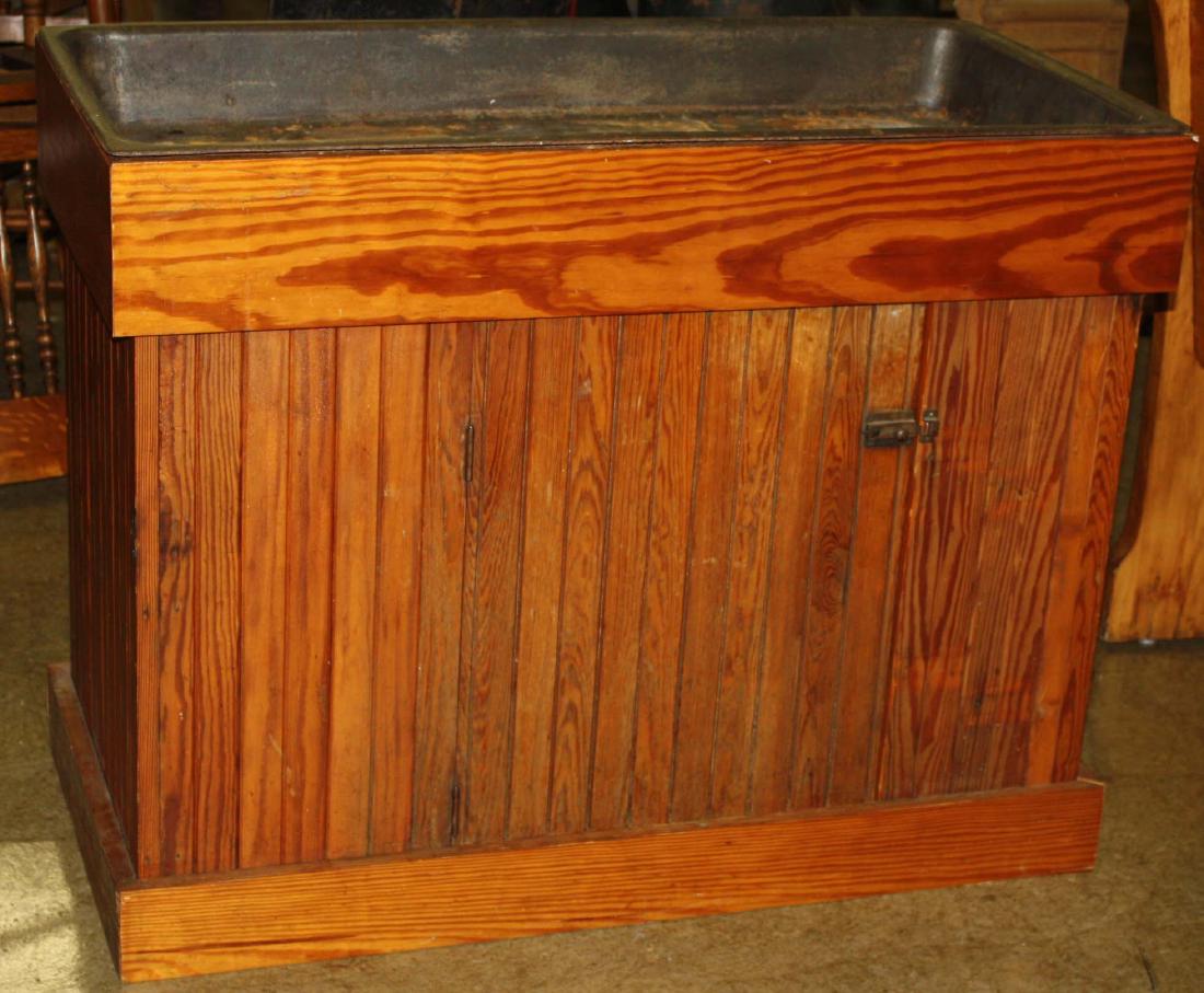 Pine wainscot dry sink: 20th c pine wainscot dry sink with older iron sink. 20 x 41"
