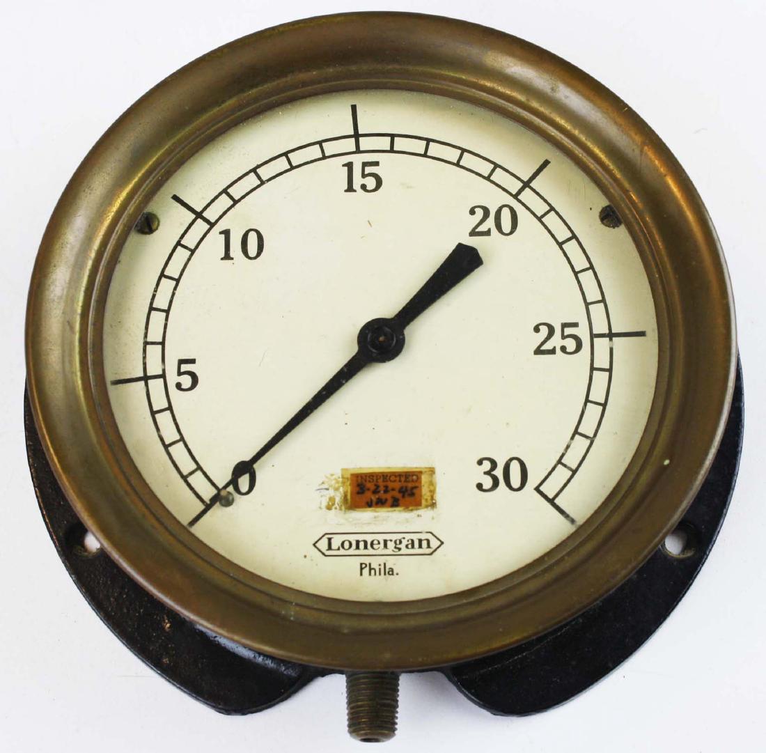 Brass and Iron battleship water gauge: Lonergan Philadelphia Brass and Iron steampunk battleship water gauge from the USS Battleship New Jersey, with tag on dial indicating last inspection of "3-22-45" -7.5" x 2.5"