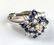 14 k w g diamond & sapphire swirl form ring