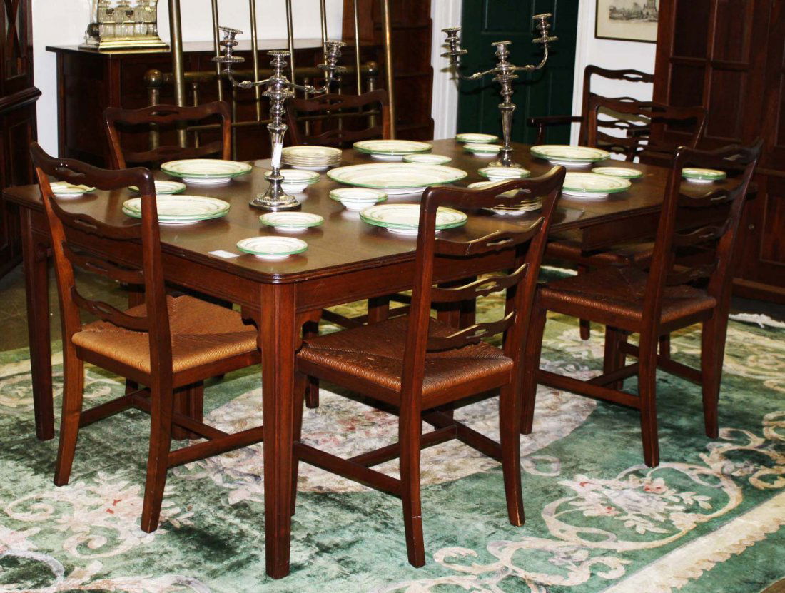 Chippendale style walnut dining room set: Fine Mid-Century Chippendale walnut 11 piece dining room set consisting of glass door corner cupboard, 8'6" extendable table with 3 extra leaves, 8 chairs and sideboard.