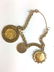 14k y g charm bracelet with two gold coins