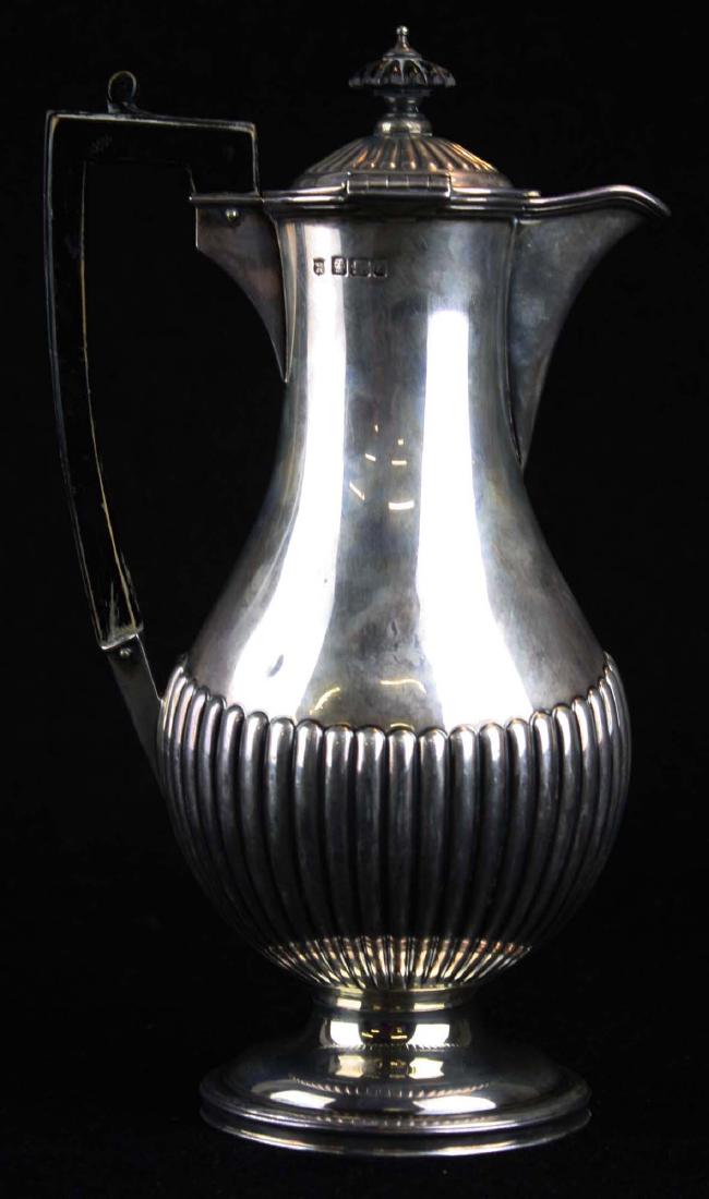 1892-93 Sheffield sterling coffee pot: 1892-93 William Gibson & John Langman Sheffield English sterling silver coffee pot with ribbed neoclassical design, on pedestal base, with ebonized handles 10" x 5.5" approximately 17 troy oz- small d