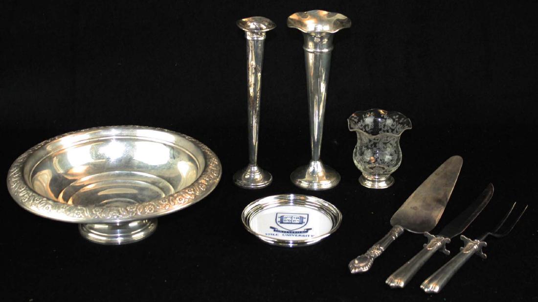 8 pcs. Sterling silver tableware: 8 pieces of various Sterling silver tableware including 2 trumpet bud vases, etched glass toothpick holder on sterling base, sterling banded milk glass coaster with Yale University crest, Wm. Rogers M