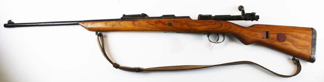 WWII German K-98 Mauser Rifle: WWII Era German Karabiner 98 Mauser Rifle in 7.92x57mm Mauser marked with German Eagle Cartouche- later sporterization refinishing to stock. This firearm is to be sold in accordance with Federal Law a