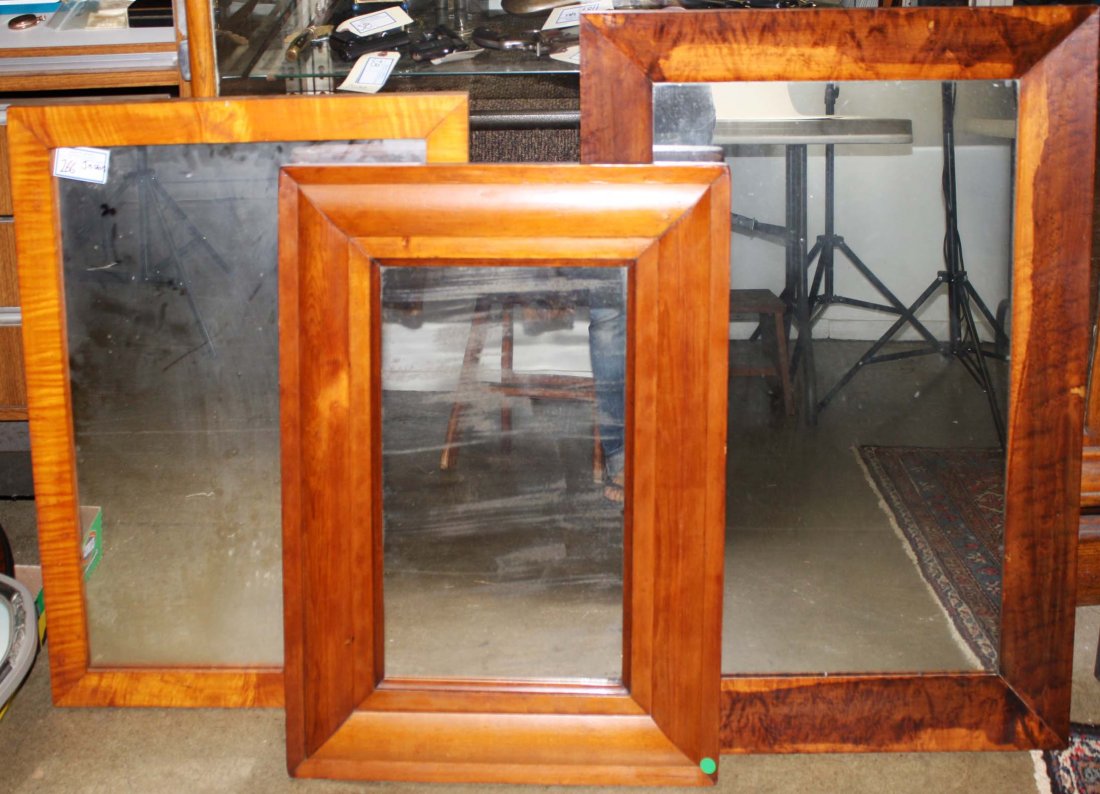 three mirrors: Three mirrors including flame maple 18 x 27 , ogee 12 x 20, and walnut 17 x 29"