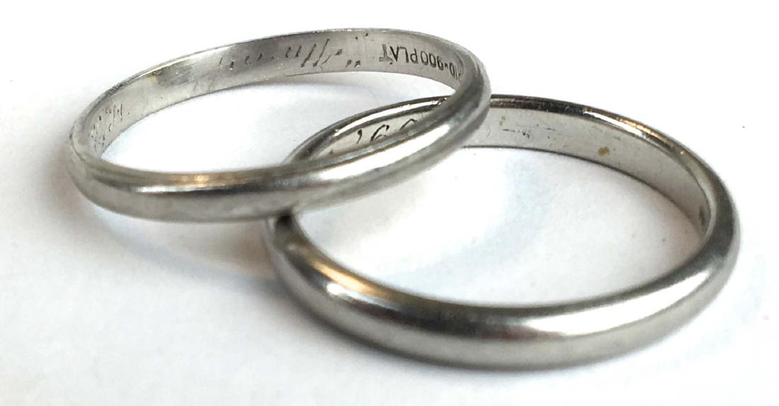 Pair of platinum wedding bands.: Pair of platinum wedding bands. Size 7 and 7.5. 6.4 grams.