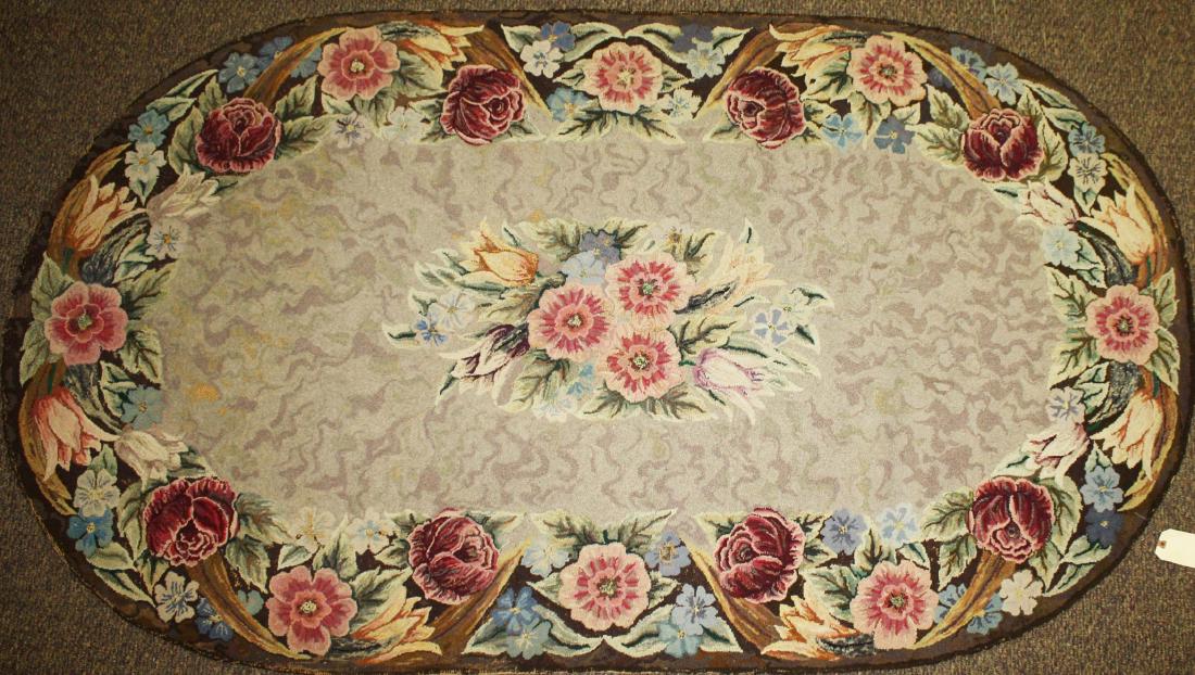 mid 19th c floral pattern oval hooked rug