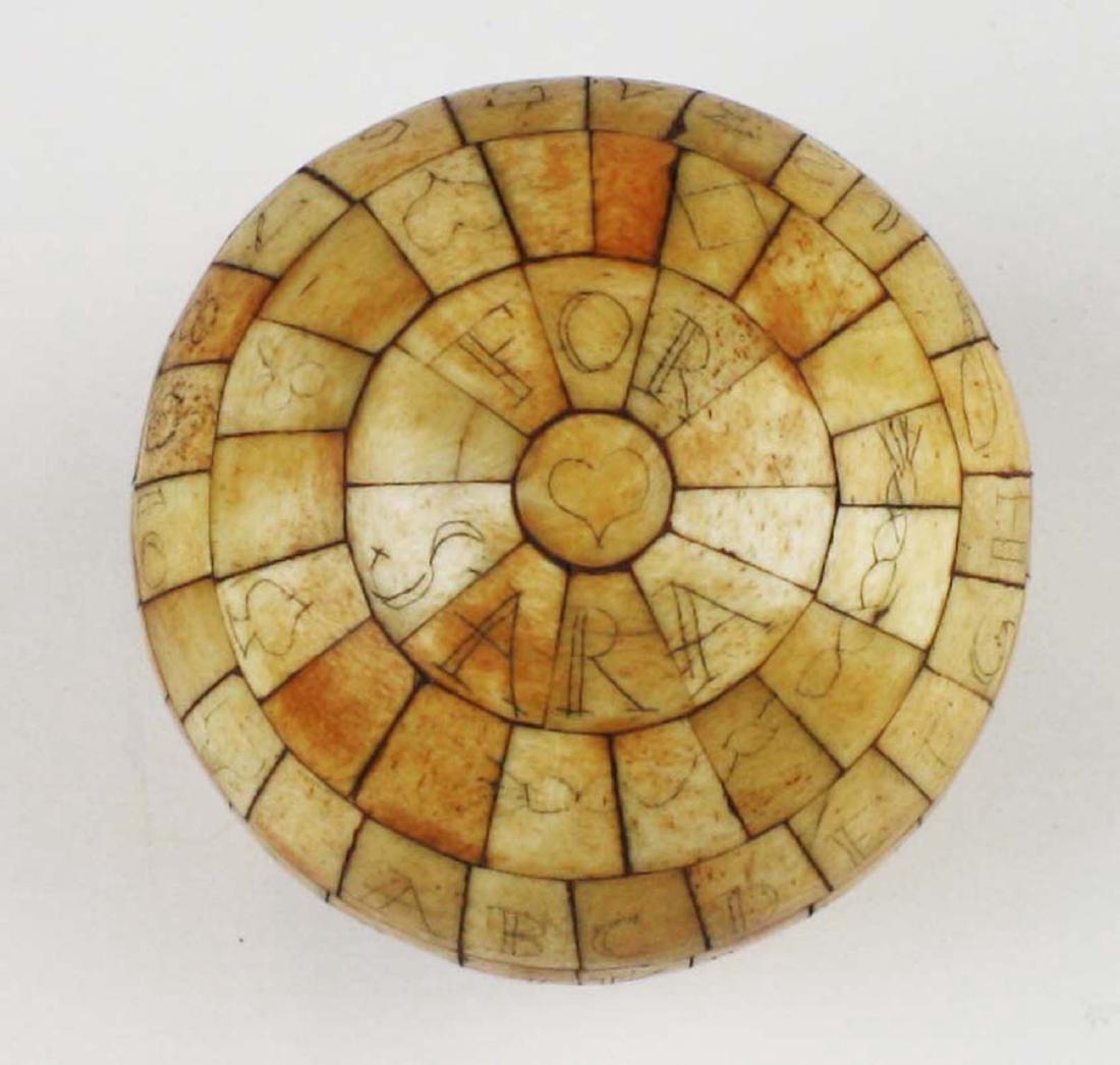 mid 19th c scrimshaw child's ABC globe: mid 19th c scrimshaw child's ABC globe, inscribed "For Saraâ€¦By Father", diameter 4"