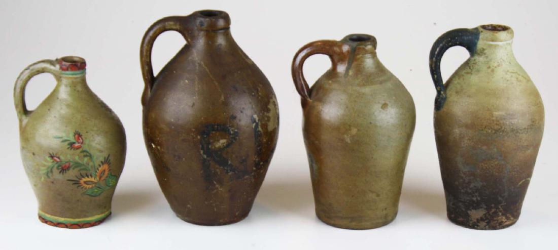 4 small early ovoid stoneware jugs (1 of 8)