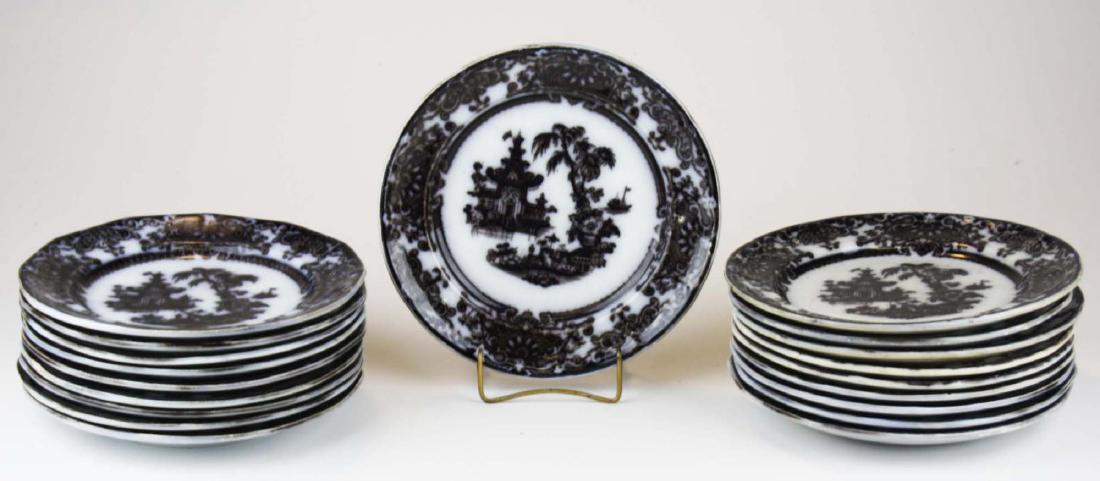 19 Mulberry Corean Ironstone luncheon plates: 19 Mulberry "Corean" transfer decorated Ironstone luncheon plates by Podmore, Walker, & Co. 8.75" dia. -some with checks and crazing