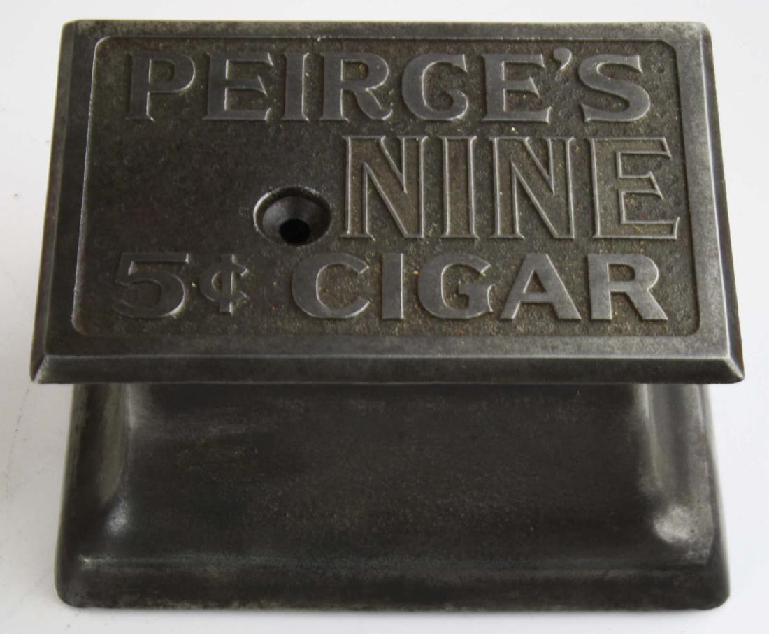 Peirce's Nine "5 cent cigar" mechanical cigar cutter: Peirce's Nine "5 cent cigar" mechanical cigar cutter , embossed steel, width 6 3/8", ht 3 1/2"