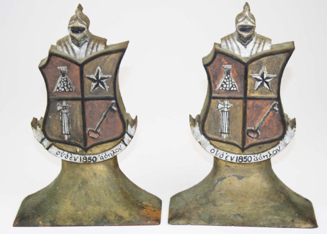 Pair of Knights of Pythias doorstops: Pair of cast iron Knights of Pythias fraternal doorstops 11" some repainting