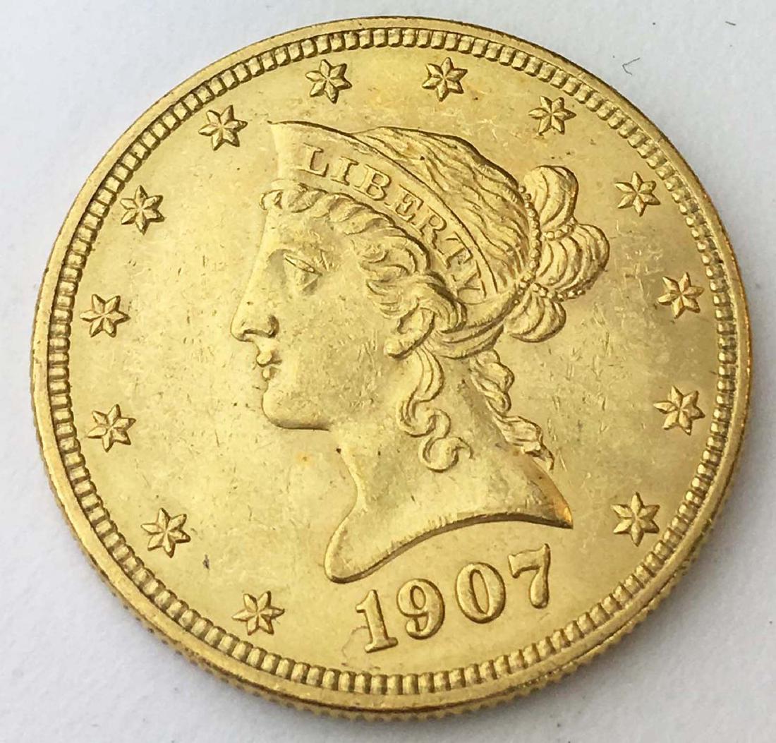 1907 Liberty US $10 gold eagle coin (1 of 2)