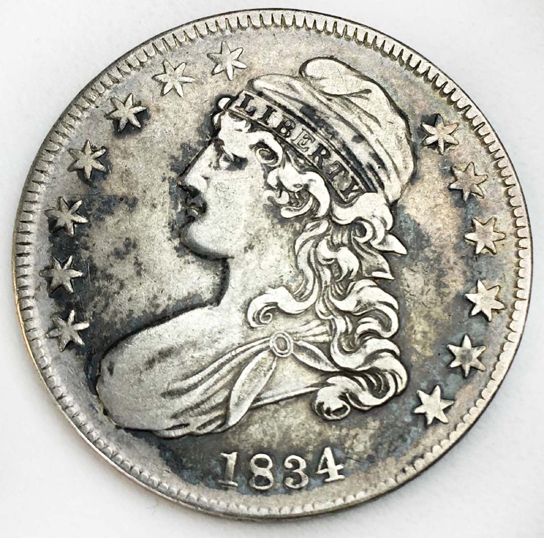 1834 Capped Bust US silver  half dollar AU50 (1 of 2)