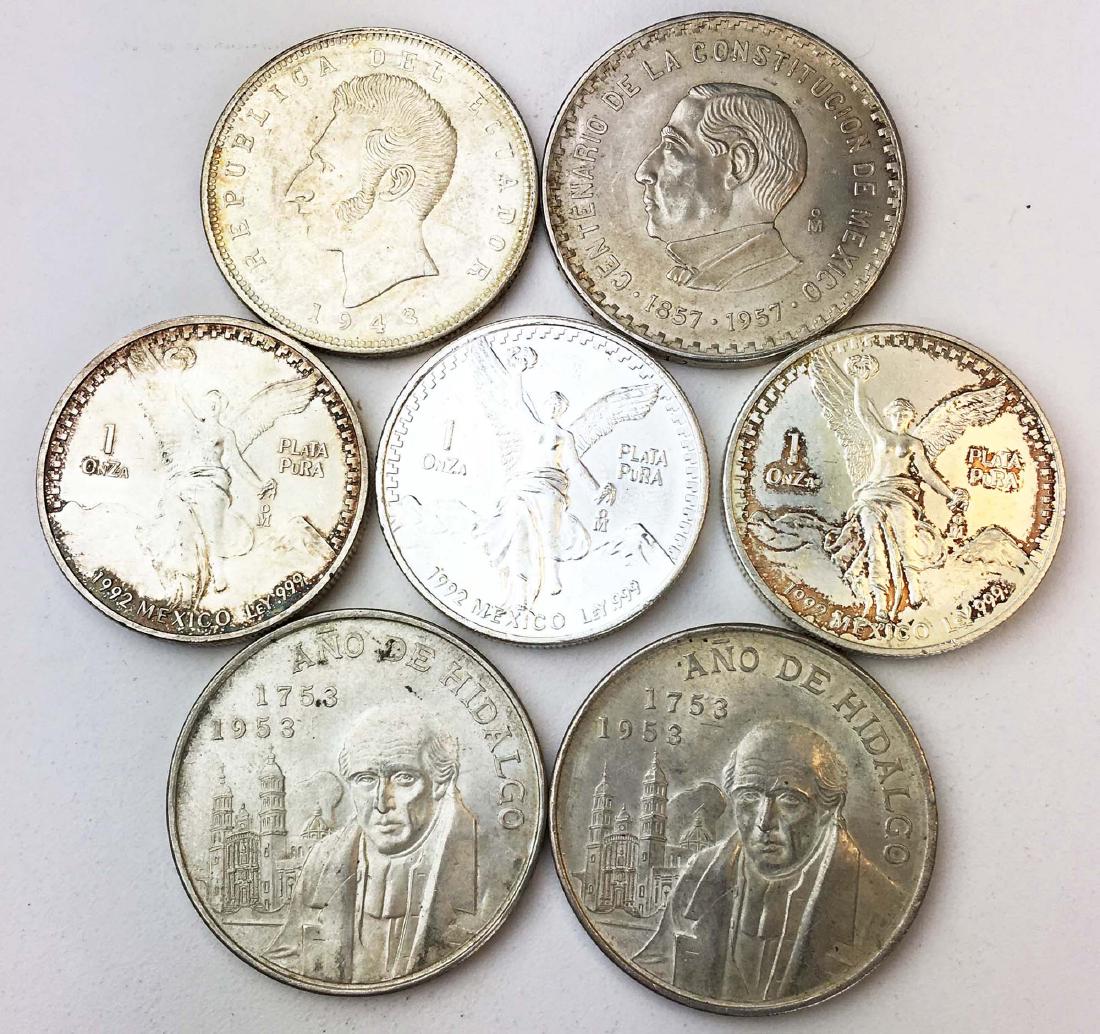 7 Mexican silver coins (1 of 3)