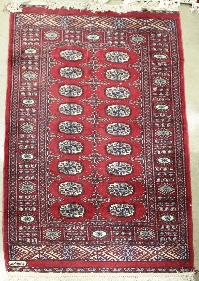 mid 20th c Tekke rug w/ signature cartouche: mid 20th c Tekke area rug with signature cartouche, 2 rows of 9 guls, 3' 1' x 5' 2"
