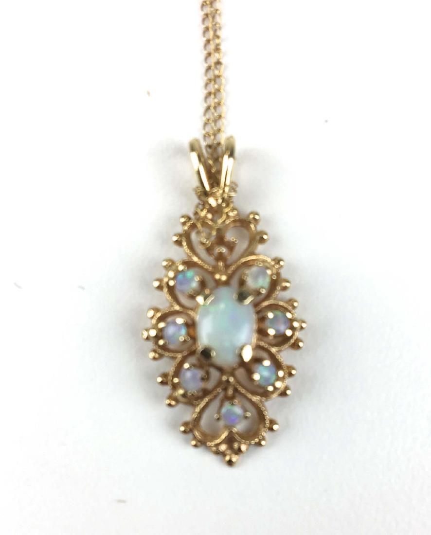 14k yellow gold and opal pendant. (1 of 3)