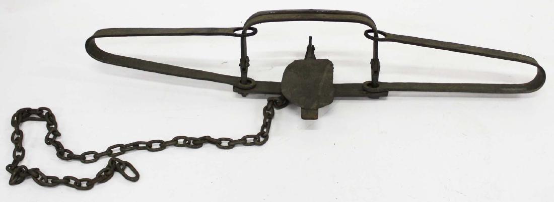 very large mid 19th c hand wrought bear trap: rare large mid 19th c hand wrought bear trap with teeth, jaw width 15", overall length 56"