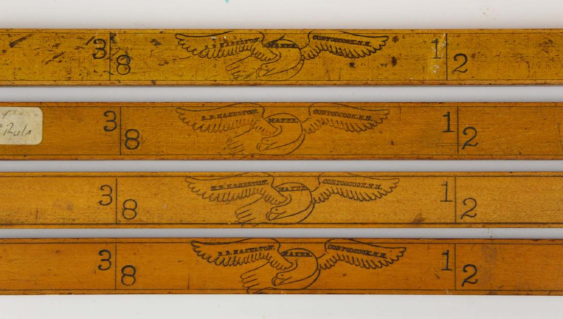 four R B Haselton, Contoocook, NH yardsticks: four R B Haselton, Contoocook, NH 36" yardsticks, inches & fractions of yards, brass ends, most with strong flying eagle logos, good surfaces, length 36"