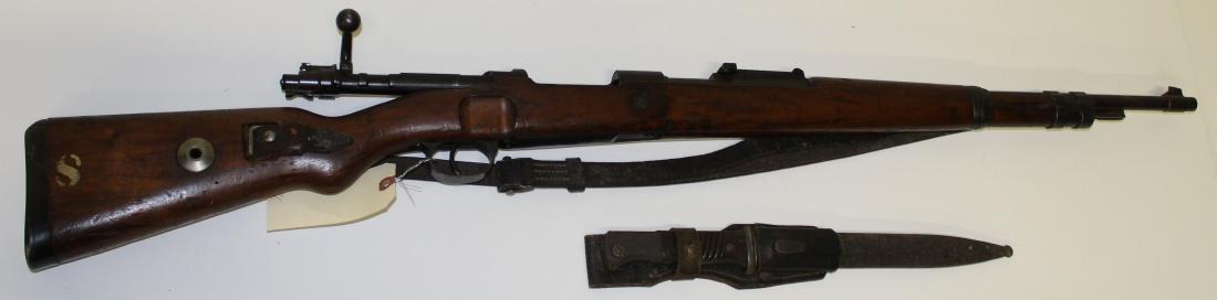 German WWII Era K-98k Mauser rifle: German WWII Era K-98k Mauser Rifle with bayonet and martial stamps dings associated with age in 7.92 Mauser -This firearm is to be sold in accordance with Federal Law. Buyer must pass NCIS background 